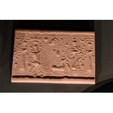 Cylinder seal with gods and celestial symbols